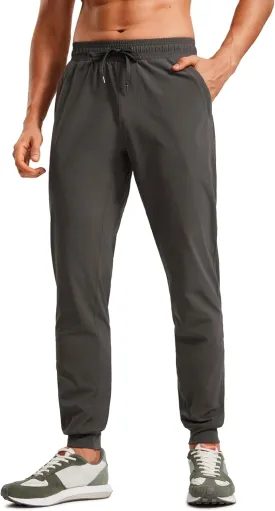 CRZ YOGA Athletic Joggers for Men 29"/31" Lightweight Water Resistant Outdoor Workout Pants with Zip Pockets